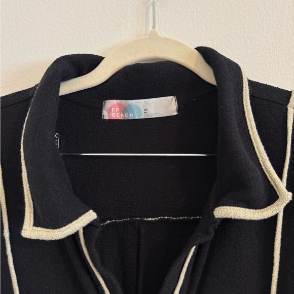 Black Button-Up Polo Romper - Picture 2 of 4